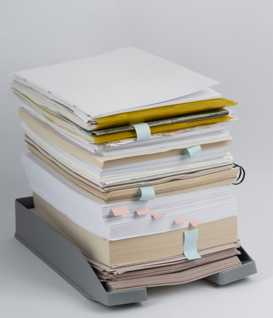 still-life-stacks-papers-documents 1